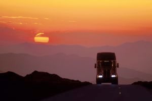 truck driving sunset