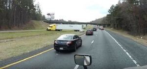 hunger fight semi uturn in median