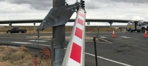 i-70 denver closed trucker rams gate and trucks on