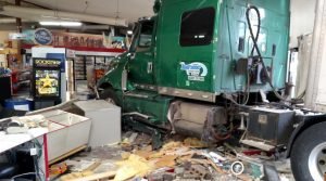 semi crashes through new lisbon travel mart in wisconsin