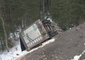 truck crash site after driver found trapped inside